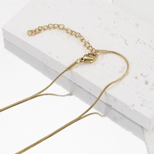 Polished gold plated stainless steel snake chain necklace with lobster clasp and extender