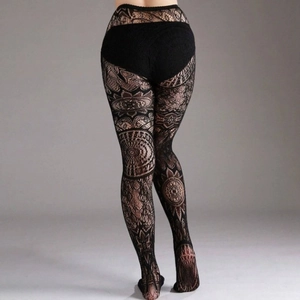 Detailed back view of black fishnet tights featuring intricate mandala floral patterns