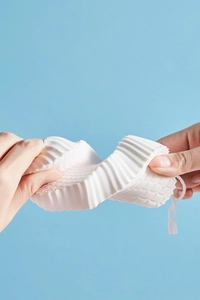 Soft exfoliating bath sponge for children with diamond texture and hanging rope