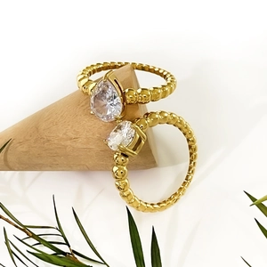 Minimalist 18K gold plated stackable rings set with pear and round sparkling zircons