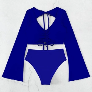 Detail view of royal blue long sleeve bikini set with front tie and high waist bottom