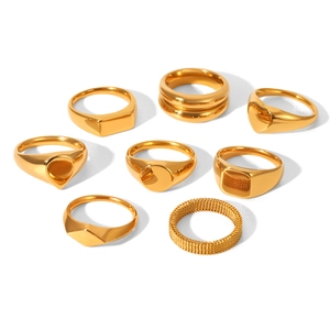 Set of 8 minimalist geometric 18k gold plated stainless steel rings for women on white