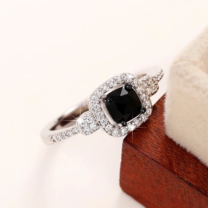 Vintage style ring featuring a square black onyx stone surrounded by sparkling pavé zircons