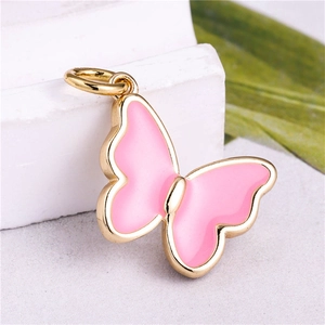 Pink enamel butterfly charm with gold plating for DIY jewelry making and pendants
