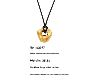 Polished gold irregular pendant on long black cord, 84cm length, eco-friendly titanium steel