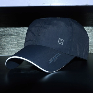 Quick-dry navy blue mesh baseball cap with embroidered M logo and curved white trim brim