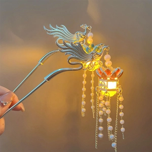 Luminous phoenix and lotus hair pin with pearl tassels for elegant Chinese style updos
