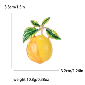 Fashionable lemon fruit brooch in yellow and green alloy, size 3.8cm x 3.2cm