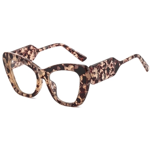 Stylish cat-eye tortoiseshell sunglasses with exaggerated frames and geometric temples