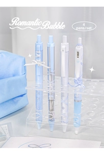 Detail of light blue ballet ribbon pens in a set of four on an acrylic display stand