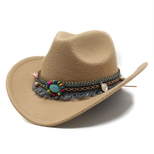 Detail of khaki wool felt western cowboy hat with bohemian beaded band and turquoise stone