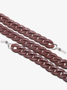 Macro shot of dark brown acrylic eyeglass chain with silver rings and silicone loops