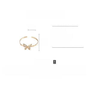 Detailed view of golden butterfly upper arm cuff with rhinestones, size 8.1cm x 8.6cm