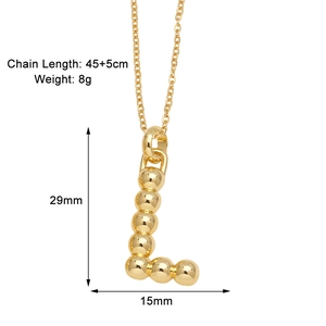 Detailed view of golden letter L pendant necklace with dimensions 45 plus 5cm chain length