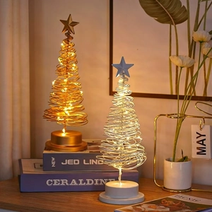Detail of spiral LED Christmas tree lamps with golden and silver frames in a warm setting