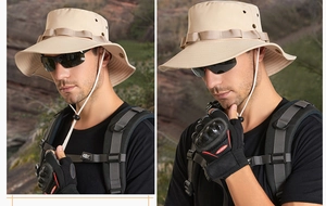 Detail of khaki outdoor sun hat featuring wide brim, breathable vents, and adjustable chin strap