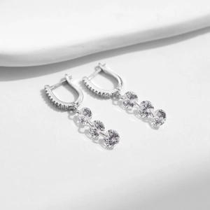 Elegant S925 sterling silver huggie earrings with three dangling round cubic zirconia stones