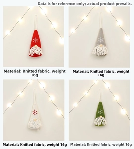 Detail of four Christmas gnomes with knitted fabric and snowflake embroidery for trees