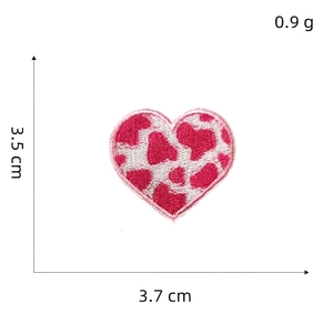 Pink heart embroidered patch with leopard pattern and white border, 3.5cm by 3.7cm size