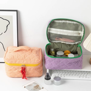 Portable large capacity quilted makeup bags with dual zippers and top handle