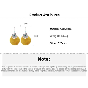 Detail view of yellow shell flower drop earrings showing dimensions and alloy materials