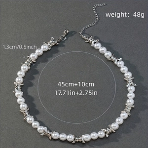 Detail view of hip-hop cross pendant necklace with 13mm pearls and size measurements