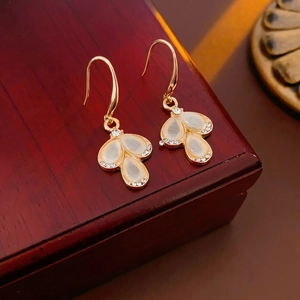 Elegant gold waterdrop earrings with opal stones and sparkling zircon accents