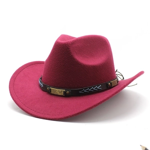 Close-up of wine red wool felt hat with embroidered black leather band and metal charms