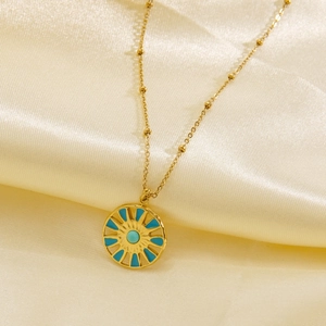 Golden 14K stainless steel sun flower necklace with turquoise inlay on satin fabric