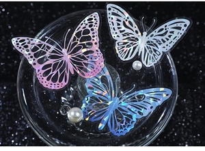 Close-up of holographic butterfly PET stickers with laser shell light effect for DIY