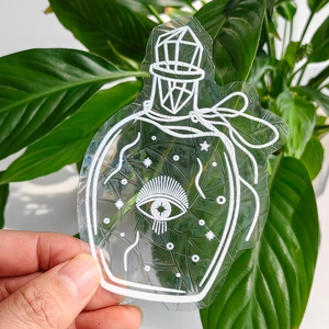 Rainbow prism window decal detail with holographic potion bottle and crystal patterns