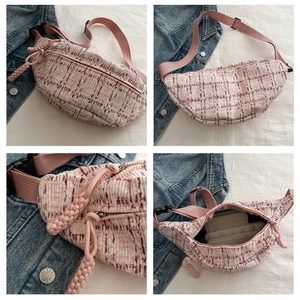 Detail view of pink tweed chest bag showing interior pocket and woven texture details