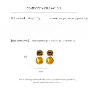Detail specifications for copper and horsehair earrings showing dimensions and weight info