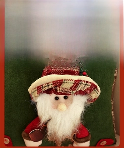 Close-up of Santa Claus linen cushion cover with red plaid hat and plush beard details