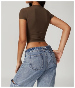 Slim fit dark brown cropped yoga top with elastic dry-fit fabric and minimal design