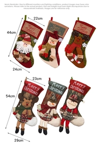 Detail view of 3D Santa, Snowman and Reindeer Christmas stockings in two sizes