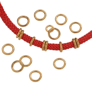 Polished gold stainless steel jump rings on red cord for DIY jewelry making
