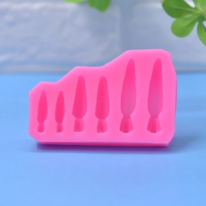 Pink silicone carrot mold for DIY cake baking and chocolate mousse making with 6 cavities