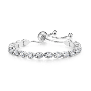 Detail of adjustable slider closure on silver tennis bracelet with oval cubic zirconia stones