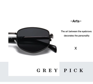 Detail of vintage metal sunglasses with gray lenses and precision hinge craftsmanship