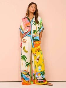Tropical print two-piece vacation set with short sleeve shirt and wide leg trousers