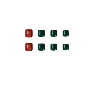 Glossy green and red press-on toenails with square shape and jelly finish on white background