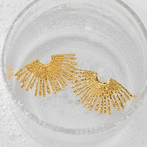 Exaggerated golden sunflower earrings with hammered metal texture in bubble water