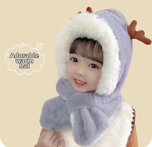 Detail of plush baby winter hat with deer antlers and integrated neck scarf