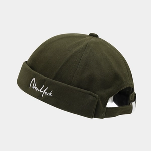 Olive green docker hat with New York embroidery and adjustable strap for street style