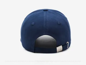 Detail of adjustable metal buckle and stitching on dark blue embroidery baseball cap