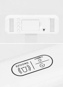 Close-up of functional buttons including snooze, dimmer and power port on 9-inch LED clock