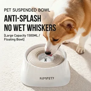 Corgi trinkt aus einem 1500ml weißen spritzgeschützten schwimmenden Haustiernapf