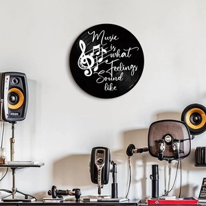 Round wooden vinyl record wall art featuring music notes and inspirational phrases