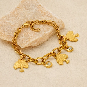 Elegante bracciale in acciaio al titanio placcato oro 18K con albero della vita e cuori